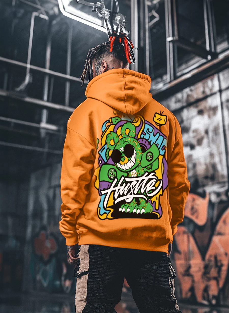 Hoodie naranja con estampado de grafiti